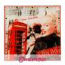 Zegar szklany kwadratowy z motywem Marylin Monroe z pieskiem oraz czerwona budka telefoniczna.